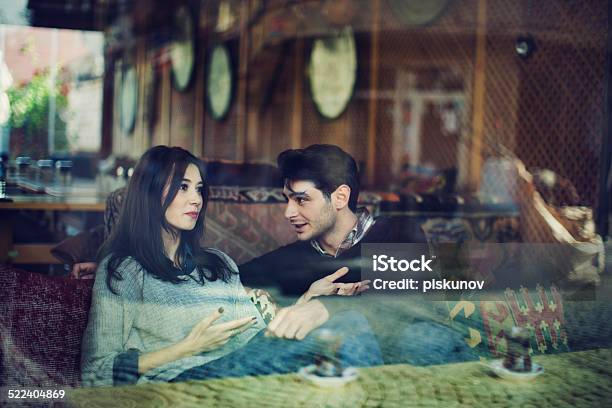 Turkish Couple In Cafe Stock Photo - Download Image Now - 20-24 Years, 20-29 Years, Adult