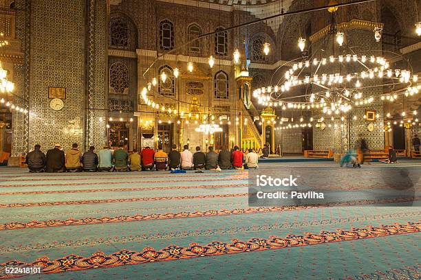 Faithful Muslims In Prayer Yeni Cami Mosqueturkish Chandelier Arabesque Stock Photo - Download Image Now