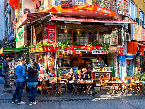 Istanbul, Turkey - October 20, 2014: People having lunch in Istanbul cafe