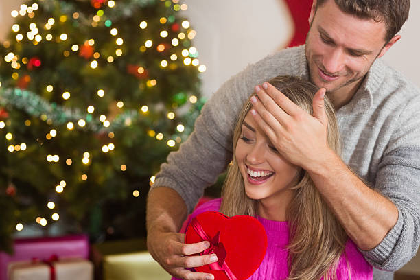 istock Loving boyfriend surprising his girlfriend 522418481