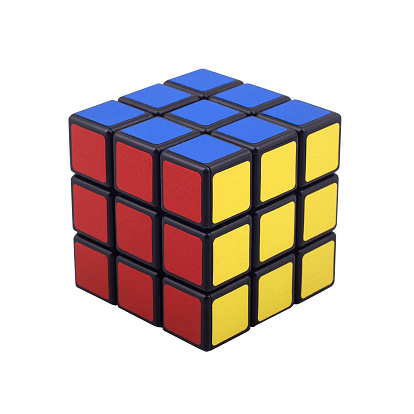 Kragujevac, Serbia - October 7, 2014: Rubik's 3x3x3 Cube on a white background. Rubik's Cube invented by a Hungarian architect Ernő Rubik in 1974.