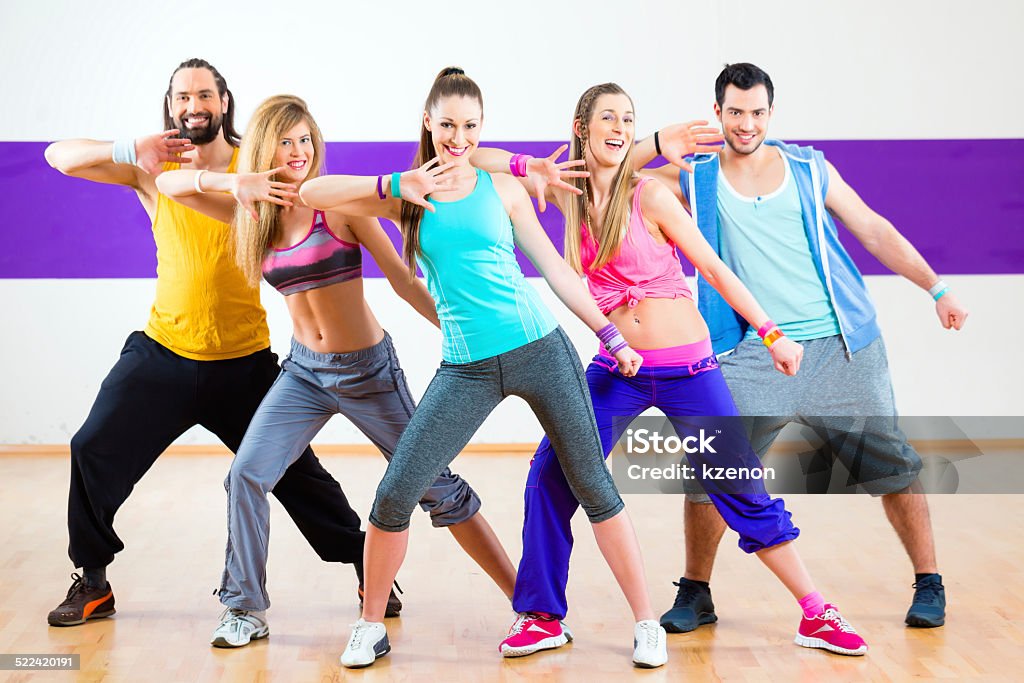 Dancer at Zumba fitness training in dance studio Group of men and women dancing zumba fitness choreography in dance school Zumba Stock Photo