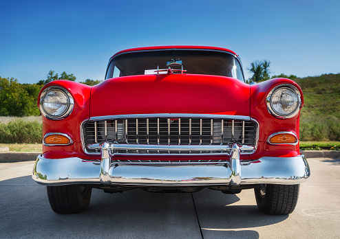 Westlake, Texas, USA - October 18, 2014: A red 1955 Chevrolet 210 is on display at the 4th Annual Westlake Classic Car Show. Front view.