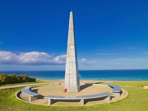Colleville sur mer, France - October 19, 2014: US First Division Infantry Memorial, Omaha Beach. One of the principal landing sites of the D-Day invasion in the on June 6, 1944 during World War II. The memorial is on a top of a cliff closeby the Normandy American Cimetery.