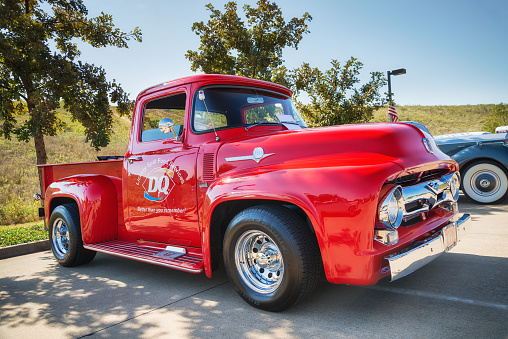 Westlake, Texas, USA - October 18, 2014: A Red 1956 Ford F-100 Pickup truck classic car is on display at the 4th Annual Westlake Classic Car Show.