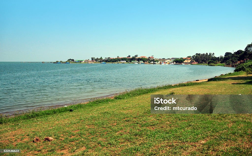 Entebbe, Uganda: the Botanical beach Entebbe, Wakiso District, Uganda: the Botanical beach on the shore of Lake Victoria - looking across the bay, at the marina and the naval base, Manyago area - photo by M.Torres Entebbe - Uganda Stock Photo