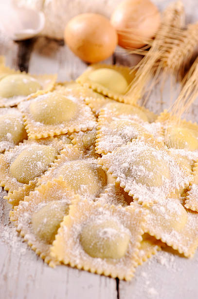 Italian pasta ravioli Home made italian pasta ravioli cooked selective focus vertical pasta stock pictures, royalty-free photos & images