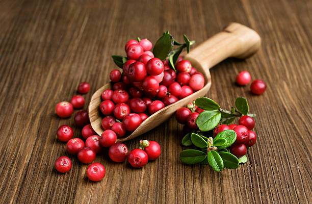 istock ripe cranberries in a wooden scoop 522439463