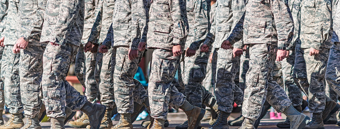US Military personnel walking in formation