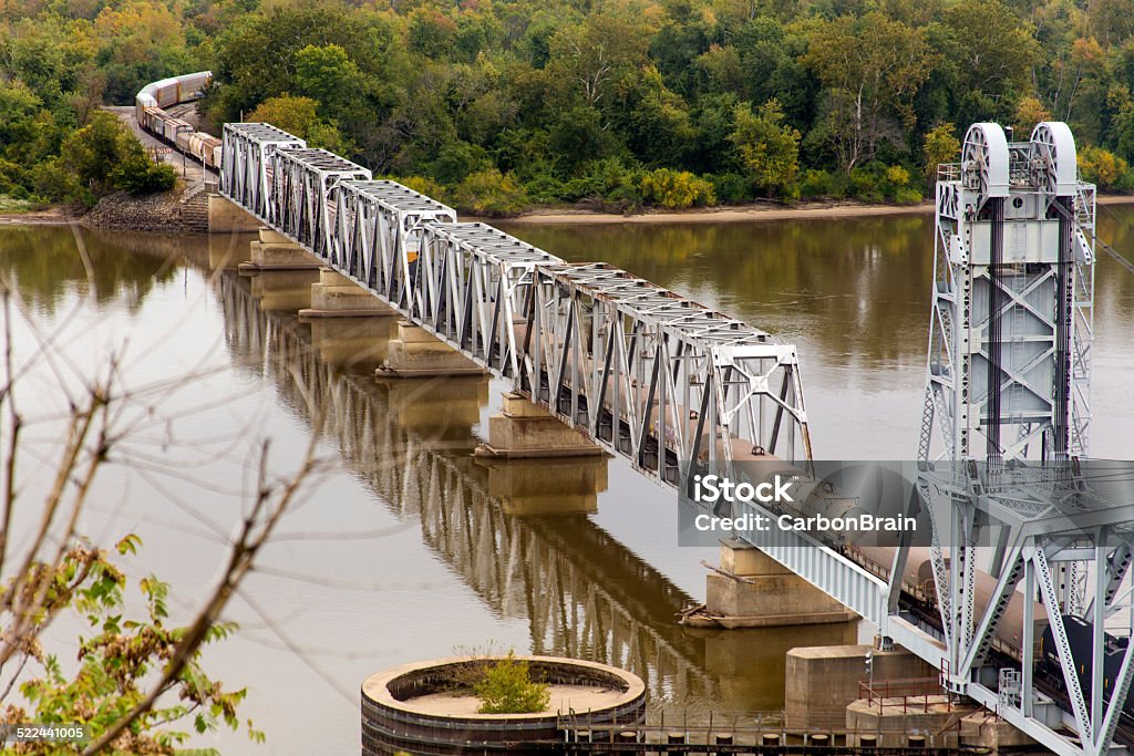 train on Wabash Bridge, Mississippi River freight train crossing Wabash Bridge over Mississippi River at Hannibal, Missouri Bridge - Built Structure Stock Photo