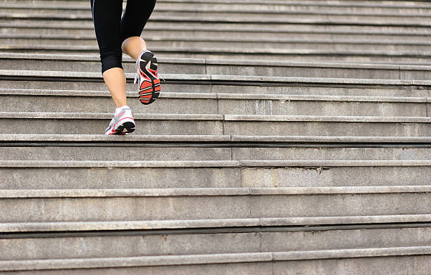 istock Runner athlete running on city stairs. 522451283
