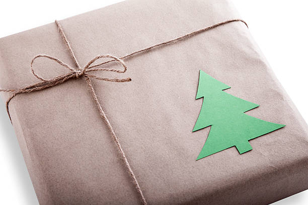 Gift and a christmas tree stock photo