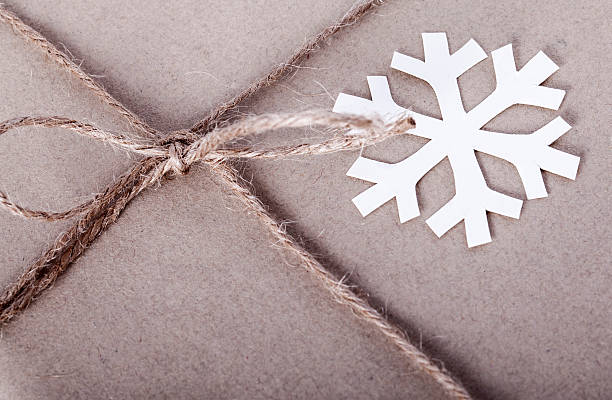 Gift with a snowflake shape stock photo