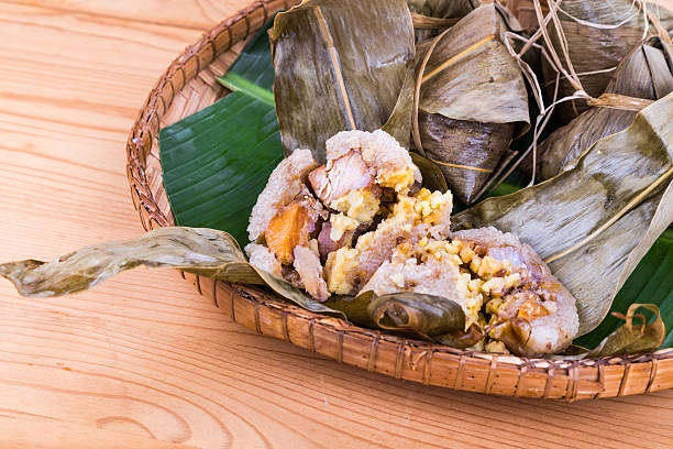 istock Freshly steamed Chinese rice dumpling on traditional rattan tray 522452408
