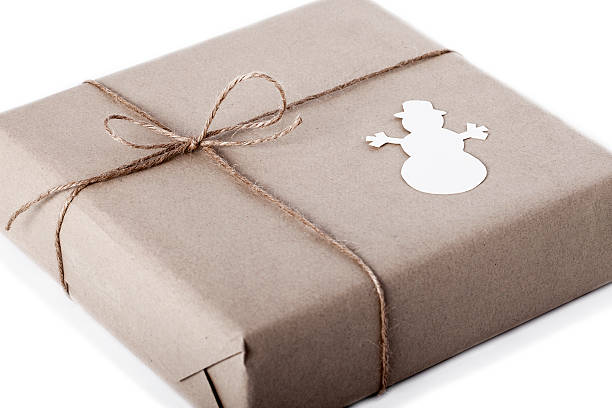Gift and a snowman shape stock photo