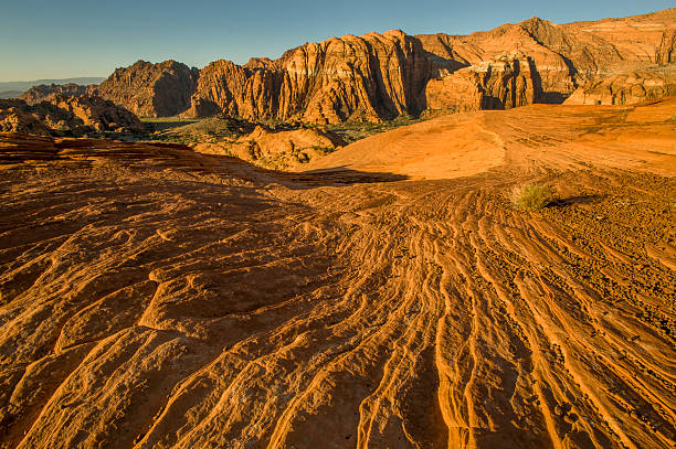 Snow Canyon State Park, St. George, Utah Petrified mudflows and sandstone escarpment, Snow Canyon State Park, Utah. snow canyon state park stock pictures, royalty-free photos & images