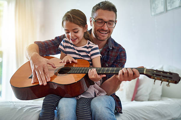 istock Sharing his passion with his daughter 522453858
