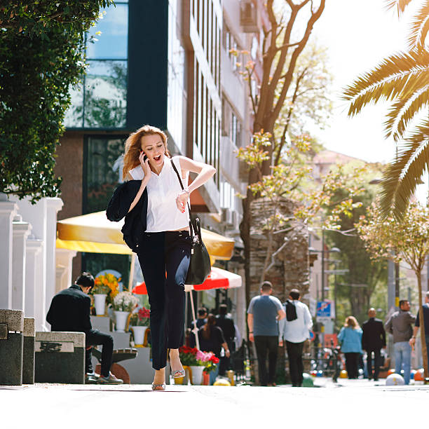 istock Business woman rushing to work 522456290