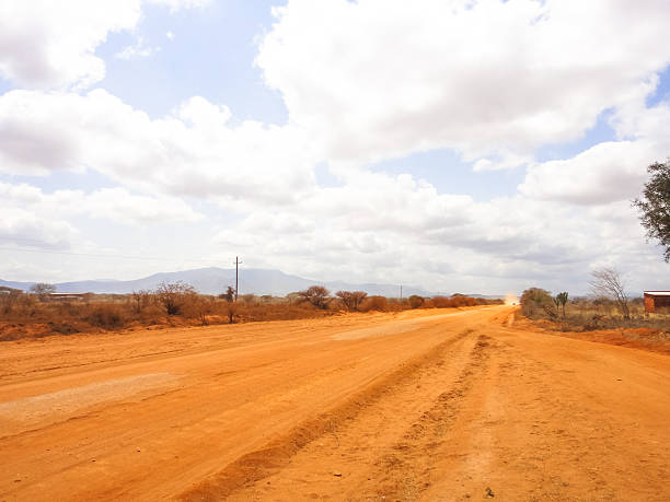 istock Dusty road to Kilimanjaro 522458792