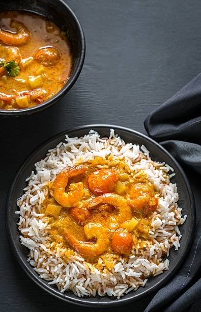 istock Thai yellow curry with seafood and white rice 522460282