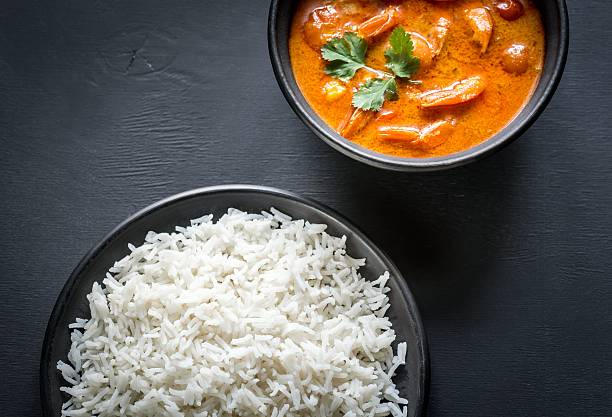 istock Thai yellow curry with seafood and white rice 522460680