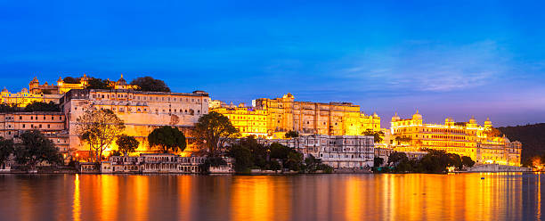 istock Udaipur City Palace in the evening panoramic view. Udaipur, Indi 522463094