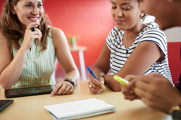 istock Unposed group of creative business people in an open concept 522463996