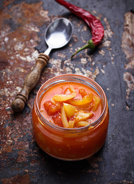 istock Pickled bulgarian peppers  in a glass jar 522464462