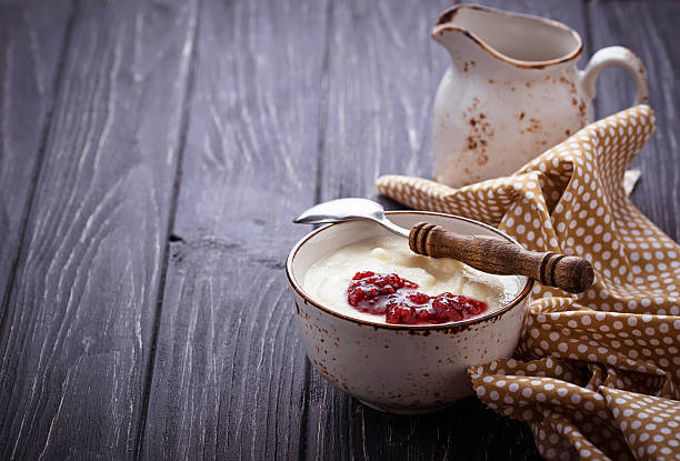 istock Sweet semolina porridge with raspberry jam 522465610