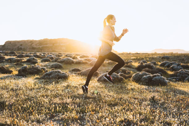istock Young woman jogging on a sunny day 522465746