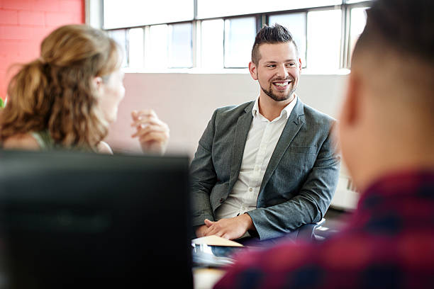 istock Unposed group of creative business people in an open concept 522465992
