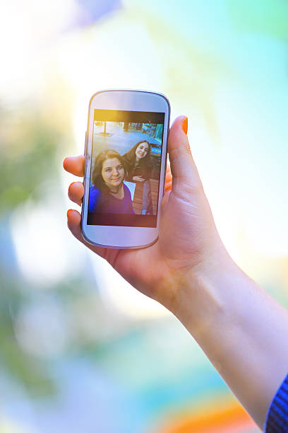 istock Best Friends Taking a Self Portrait with Mobile Phone 522468129