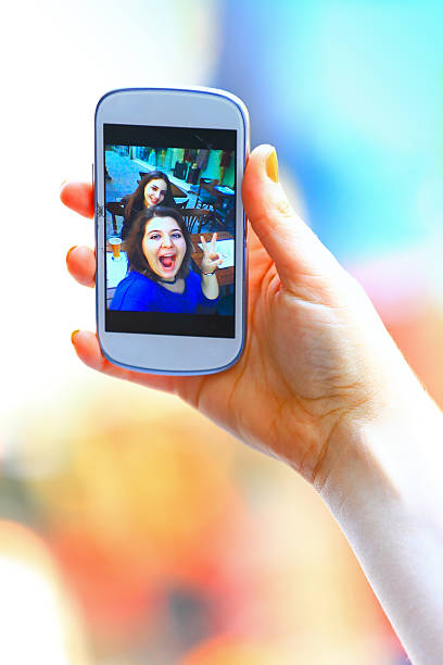 istock Best Friends Taking a Self Portrait with Mobile Phone 522468147