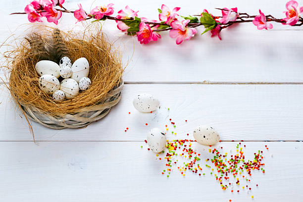 istock Beautiful Easter background with flowers and nest 522468492