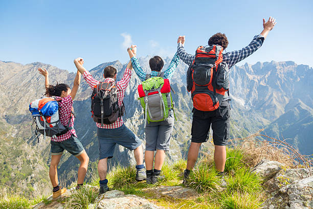 istock Happy Hikers at Top of Mountain 522468543