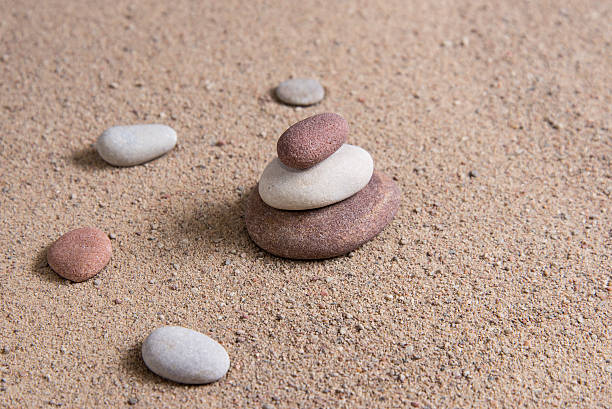 istock zen garden sand waves and rock sculptures 522469127