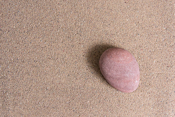 istock zen garden sand waves and rock sculptures 522469133