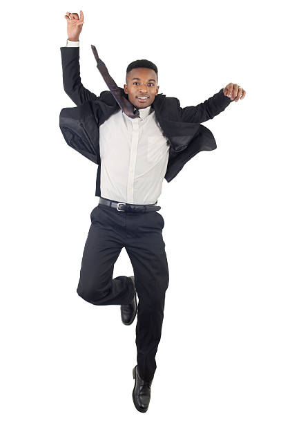 istock successful business man jumping in white background 522469870