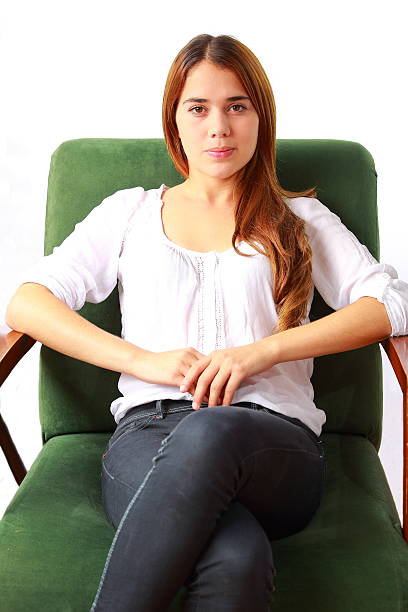 a green single leather sofa isolated with white background.