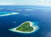 heart island in the maldivian tropical sea