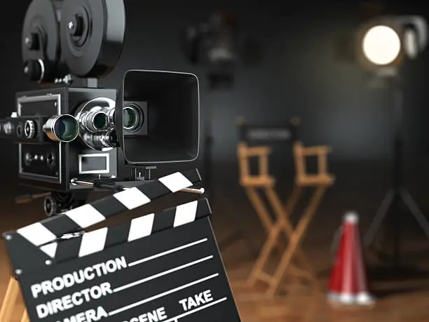 Photo of Video, movie, cinema concept. Retro camera, flash, clapperboard