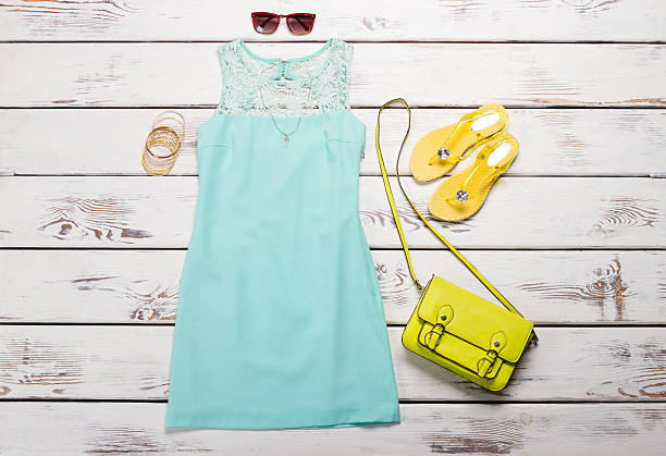 istock Beautiful turquoise dress with accessories. 522470726