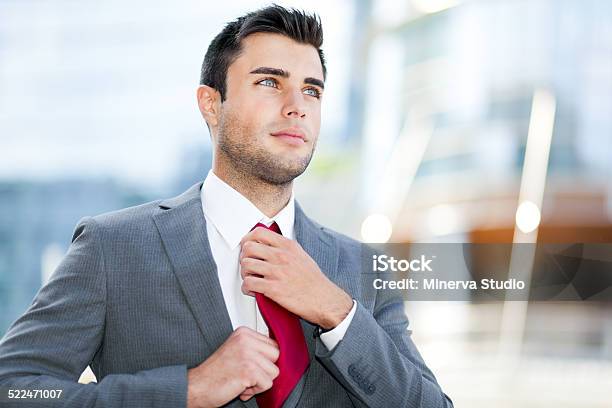 Confident Male Manager Outdoor Stock Photo - Download Image Now - Adjusting, Adult, Adults Only