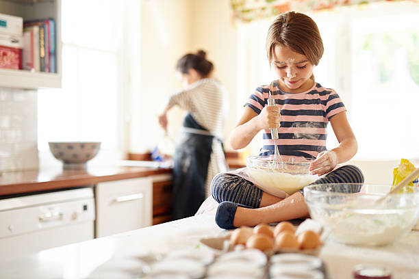 She's a great little helper in the kitchen