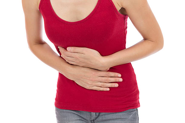 istock Woman with a stomach pain 522471563