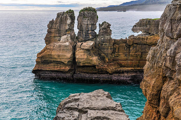 istock Pancake rocks in Punakaiki, New Zealand 522472464