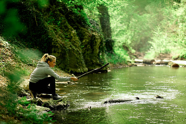 istock Young woman splash water 522472960