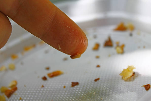 istock Leftover pieces of bakery on finger 522473022