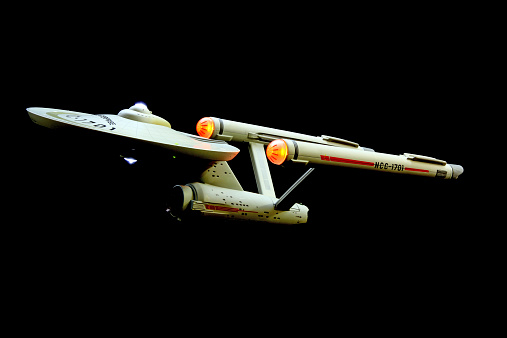 Vancouver, Canada - March 25, 2014:A model of the Federation starship USS Enterprise, commanded by Captain James T. Kirk in the original Star Trek series. The model is made by Art Asylum and released by Diamond Select.