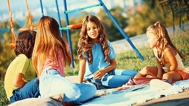 istock Group of kids playing outdoors. 522473210